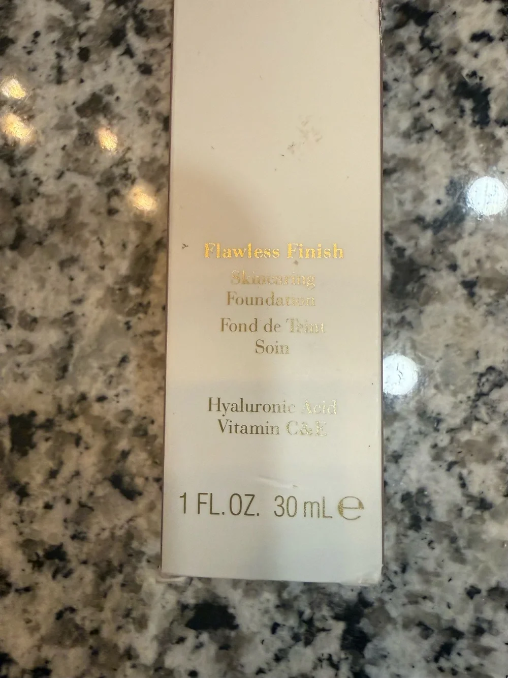 Elizabeth Arden Flawless Finish Skincaring Foundation - Black & White Text Label